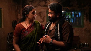 തുടരും háttérkép
