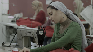 فتاة المصنع háttérkép