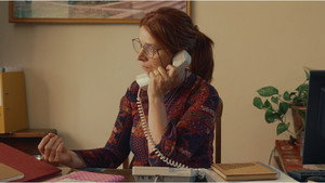 Una directora Extraordinaria háttérkép