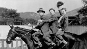 Three Men on a Horse háttérkép