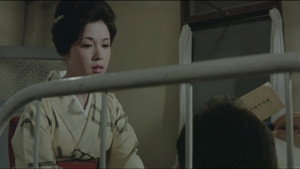 女は二度生まれる háttérkép
