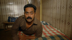 കൂമൻ háttérkép