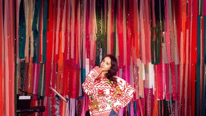 蔡依林  JOLIN 编织梦想丑毛衣派对 háttérkép