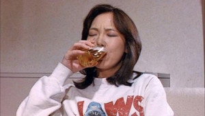 ズームアップ　ビニール本の女 háttérkép