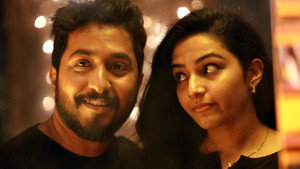 ഒരു സിനിമാക്കാരന്‍ háttérkép