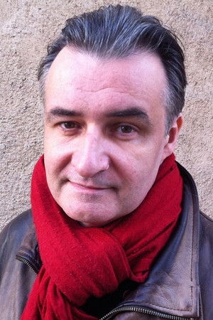 John Arnold profil kép
