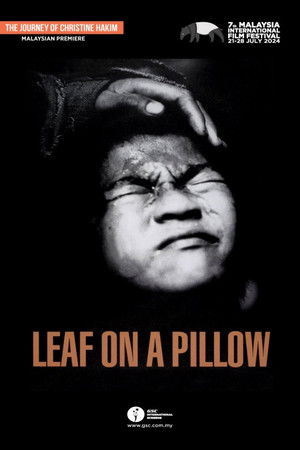Daun di atas bantal poszter
