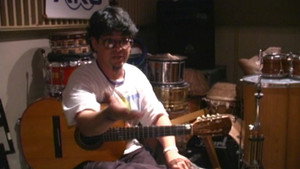 Una Guitarra y Joe háttérkép