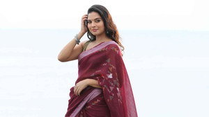 வல்லான் háttérkép