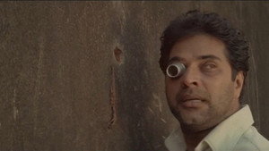 ഭൂതക്കണ്ണാടി háttérkép