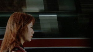 赫い髪の女 háttérkép