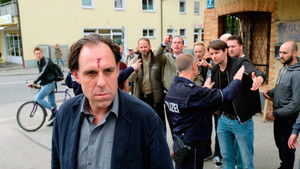 Kühn hat zu tun háttérkép