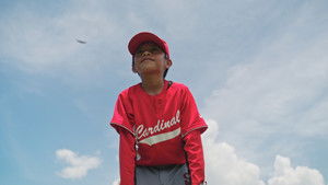A Million Smiles: The Story of Baseball Without Borders háttérkép