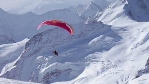 Ueli Steck - Paraglides Between Mountains In The Swiss Alps háttérkép